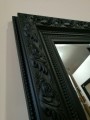 Krysztalowe lustro w zdobionej czarnej ramie 140x60 