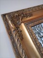 Duże lustro do przedpokoju ze złoconą ramą 180x100
